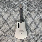 Lava Music Me 36" Touchscreen Acoustic Electric Smartguitar W/ Gig Bag, Gold. Fixed Price $607.20.