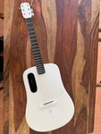 Lava Music Me Smart Acoustic Guitar 38" White. Fixed Price $450.00.