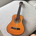 Cnblue Classical Guitar Brown 6 String Right-handed Standard Body. Fixed Price $30.00.