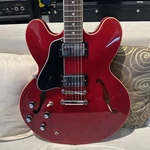 Epiphone ES-335 Left-handed Semi-hollow Body Electric Guitar W/ Case Cherry. Fixed Price $545.00.