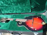 Washburn M3SWETWRK-D Americana Series Mandolin Wine Red With Hard Case. Fixed Price $950.00.