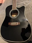 Takamine TAKGD30CE12BLK String Acoustic Guitar - Black. Fixed Price $1600.00.