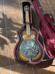 Dobro Acoustic Resonator Guitar Sunburst Single-cone Spider Bridge 6 String Case. Fixed Price $1500.00.