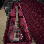 Alvarez Electric Bass Guitar 6 String Solid Purple Right-handed W/ Case. Fixed Price $550.00.