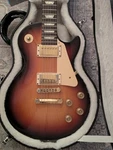 2007 Gibson Les Paul Studio Electric Guitar Fireburst Finish Gold Hardware Ohsc. Fixed Price $1000.00.