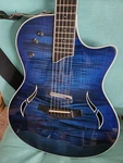 Taylor Blue Acoustic-electric Cutaway 6-STRING Right-handed Maple + Strap. Fixed Price $1500.00.