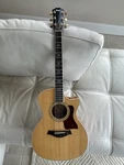 Taylor Acoustic Guitar With Pickup. Fixed Price $2900.00.