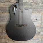 Ovation Adamas MD80-NWT A/e Guitar Natural Woven Texture. Fixed Price $4199.00.