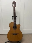 Lag Tramontane TN170ASCE Slim Auditorium Acoustic Guitar W/electronics- Natural. Fixed Price $599.99.