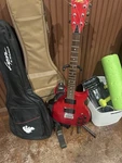 Lyon L115 By Washburn Righty Electric Guitar, Never Played, Stand Case Too. Fixed Price $225.00.
