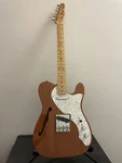 2000 Fender Mexico Telecaster Thinline 1969 Re-issue Natural Mahogany Guitar. Fixed Price $1482.00.