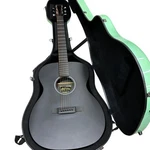 Martin Omxae Black Acoustic Guitar With External Hard Case Used 12602R5. Fixed Price $1079.76.