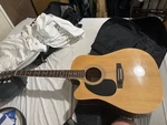 Johnson Model JG-624-CN Left-handed Guitar With Bunch Of Extras In Bag Pouch. Fixed Price $200.00.