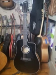 Taylor 250CE Black Plus Acoustic Electric Guitar. Fixed Price $1075.00.