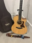 Taylor 314CE Studio Acoustic Eletric Guitar W/ Hard Case, Capo, Tuner, & Picks. Fixed Price $2290.00.
