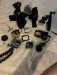 Gopro HERO5 With 3 Batteries, Dual Charger, Case, Housing, And Accessories. Fixed Price $110.00.