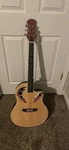 Acoustic-electric Dreadnought Guitar, 6 String, Natural, Decorative Sound Holes. Fixed Price $150.00.