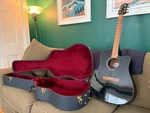 Guild Acoustic-electric Guitar And Hard Case. Fixed Price $450.00.