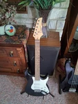 Crescent Six String Electric Guitar With Case. Fixed Price $150.00.
