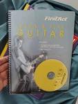First Act Learn And Play Acoustic Electric Guitar Book 2001 W/disc. Fixed Price $8.00.