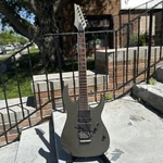 Ibanez RG5EX1 - Gray Pewter W/ Emg Pickups. Fixed Price $325.00.