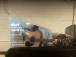 Cort AD810 Standard Dreadnought Acoustic Guitar 6 String Spruce Mahogany. Fixed Price $90.00.