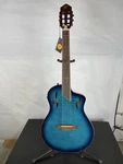 Very Good Ortega Tourplayer Thinline Acoustic-electric Classical Guitar, Flamed. Fixed Price $427.49.