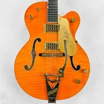 Gretsch G6120TM Chet Atkins Nashville Hollow Body Tiger Maple 2009 - Orange. Fixed Price $2499.00.