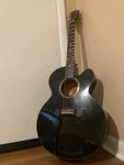 1997 Gibson EC-10 Guitar Black. Comes With The Original Hard Case.. Fixed Price $1500.00.