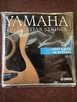 New Yamaha Folk Guitar Set Light Gauge 80/20 Brass - FG12. Fixed Price $14.00.