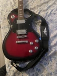 Keith Urban Electric Guitar Red Solid Body 6 String With Strap Included. Fixed Price $150.00.