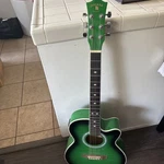 Indiana Madison Acoustic/electric Guitar Quilted Green. Fixed Price $125.00.