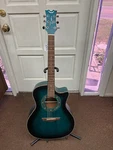 Dean Exotica Quilt Ash Acoustic Electric Guitar Trans Blue Satin B-stock. Fixed Price $349.99.